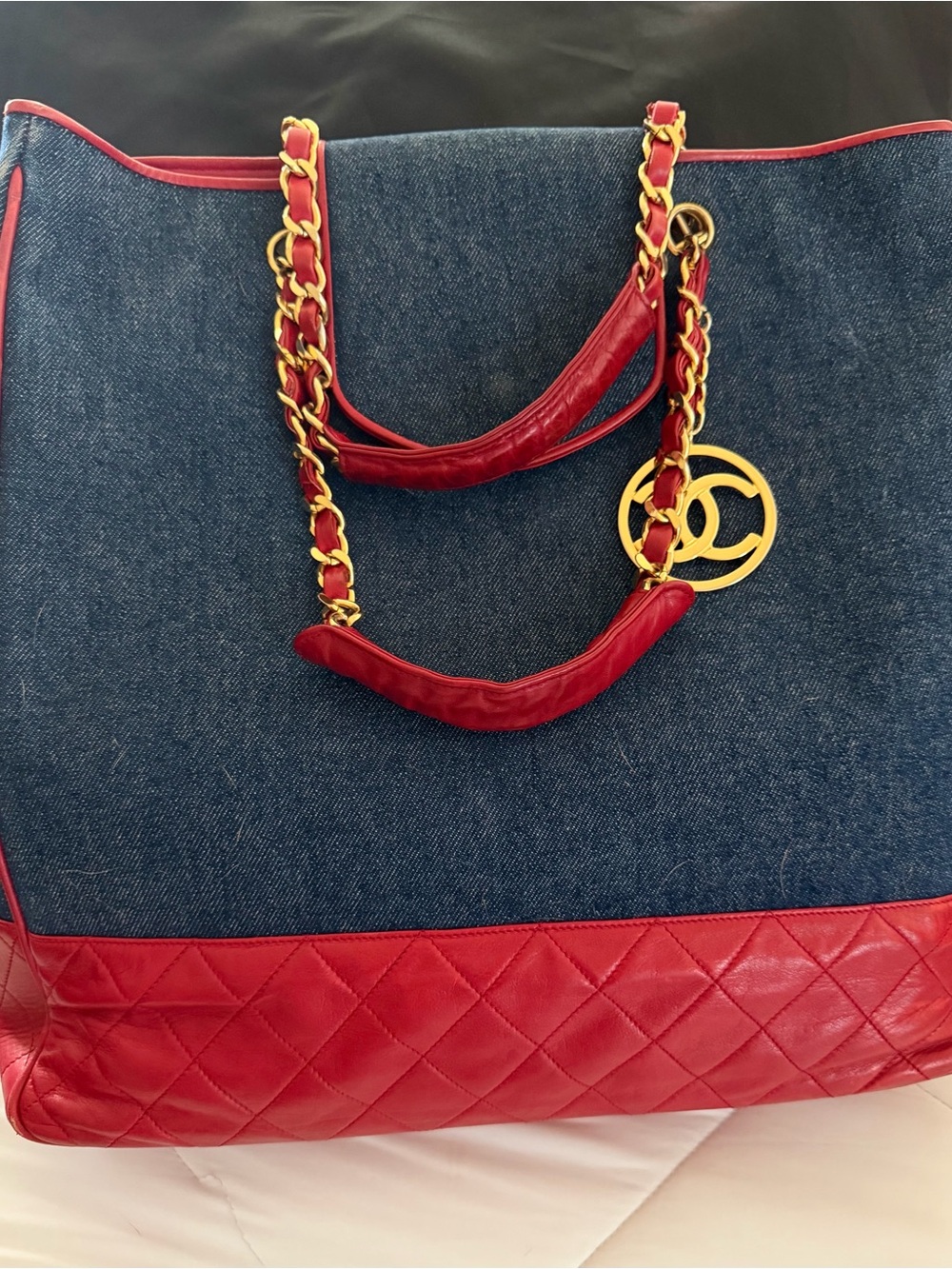 CHANEL Denim Tote with Red Leather Trim and Gold Chain Handles